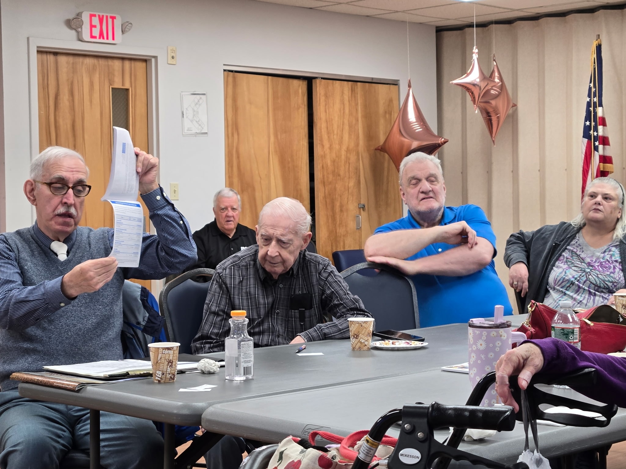 Senior veteran at community meeting